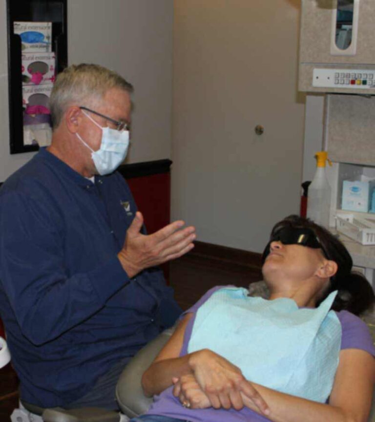 Dr. Kitzmiller talks to patient about treatment in Apex, NC